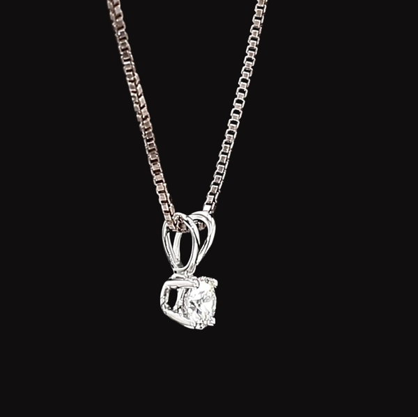 White Gold necklace with a diamond pendant on a black background