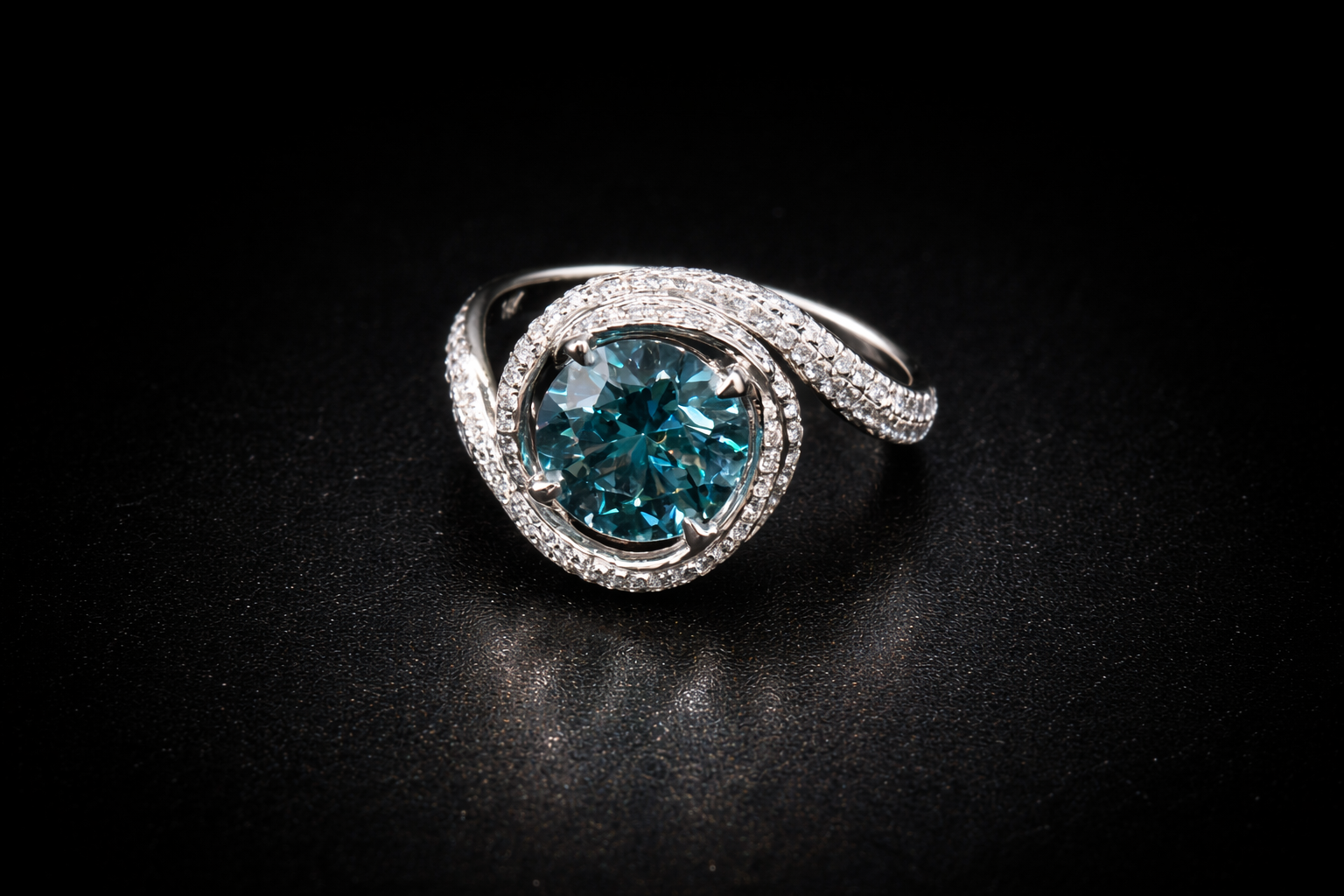 White Gold ring with a blue diamond center stone on a black background
