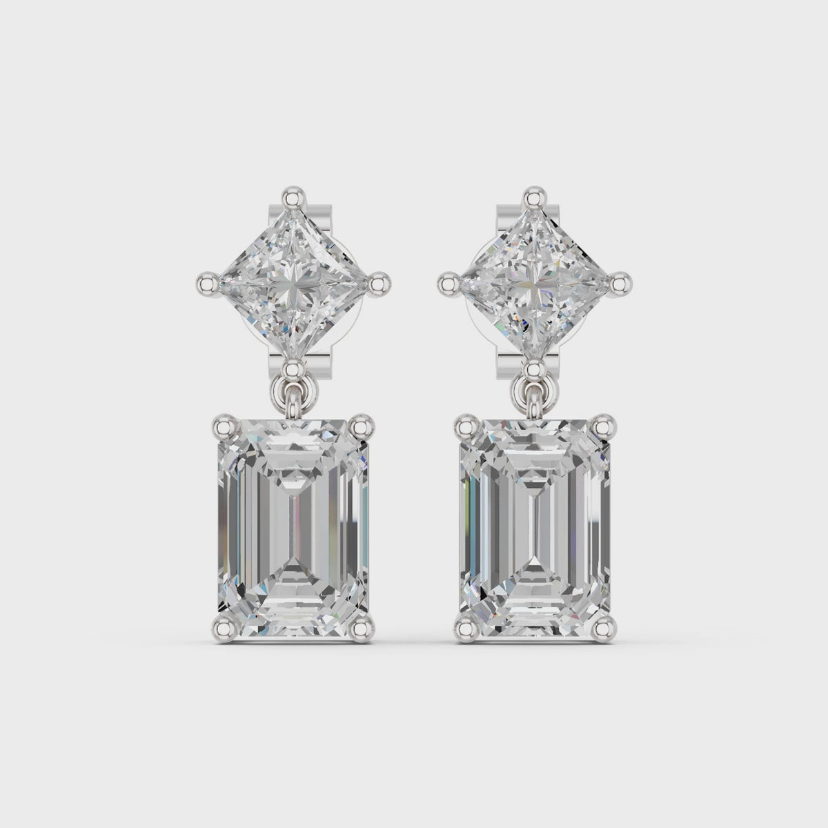 Emerald Cut And Princess Cut Lab Diamond Dangle Drop Earring in 14K White Gold – video