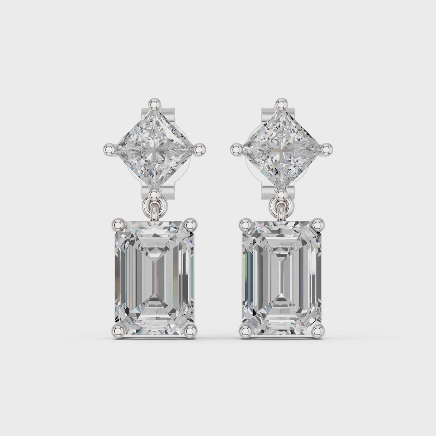 Emerald Cut And Princess Cut Lab Diamond Dangle Drop Earring in 14K White Gold – video
