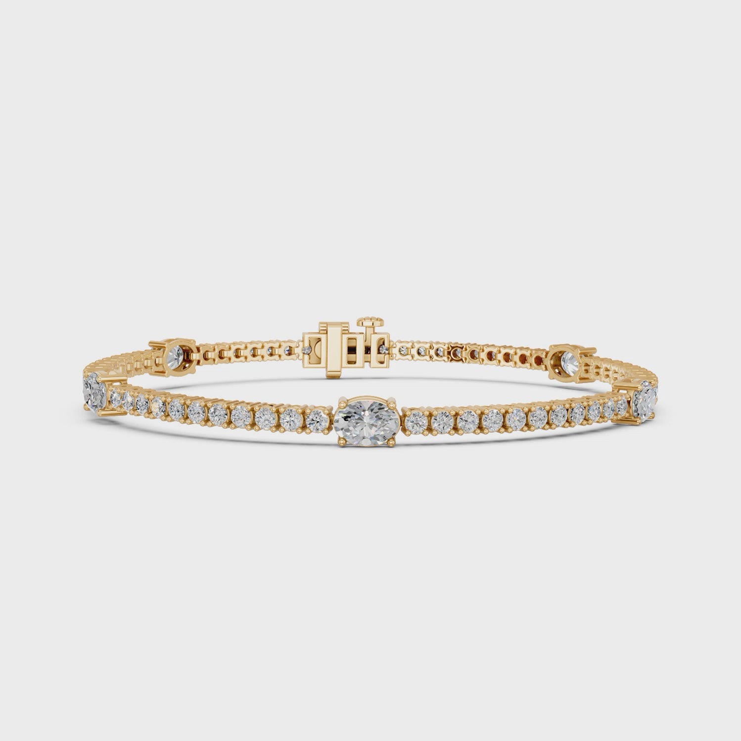 Oval Lab Diamond Stationed Tennis Bracelet in 14K Yellow Gold – video