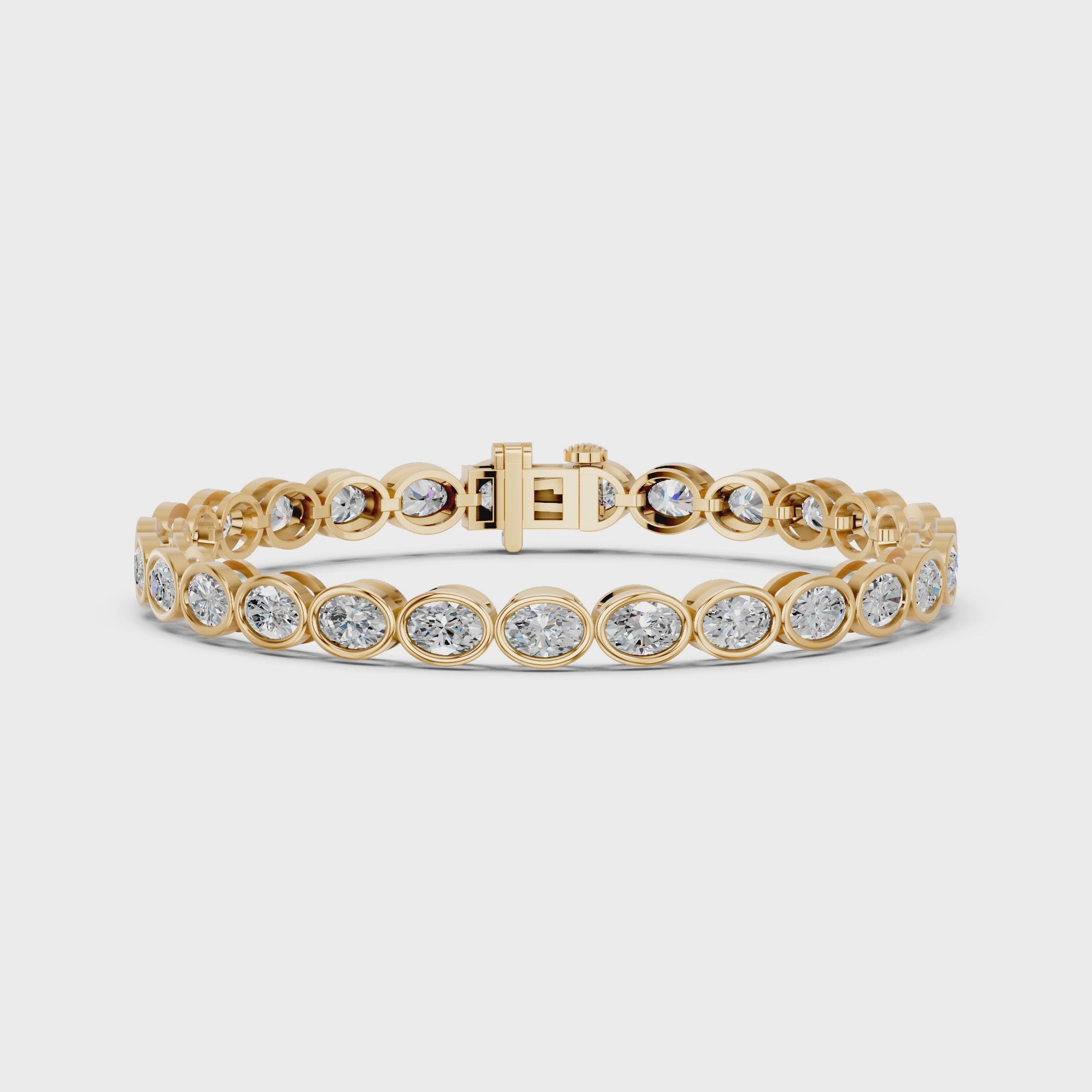 Oval Lab Diamond E-W Bezel Tennis Bracelet in 14K Yellow Gold – video