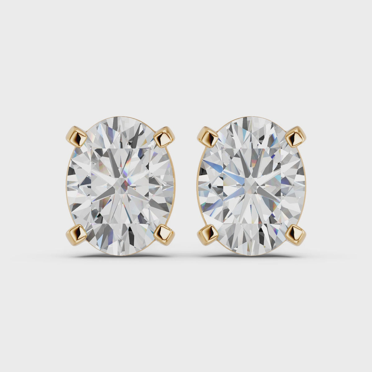Oval Lab Diamond Solitaire Stud in 14K Yellow Gold – video
