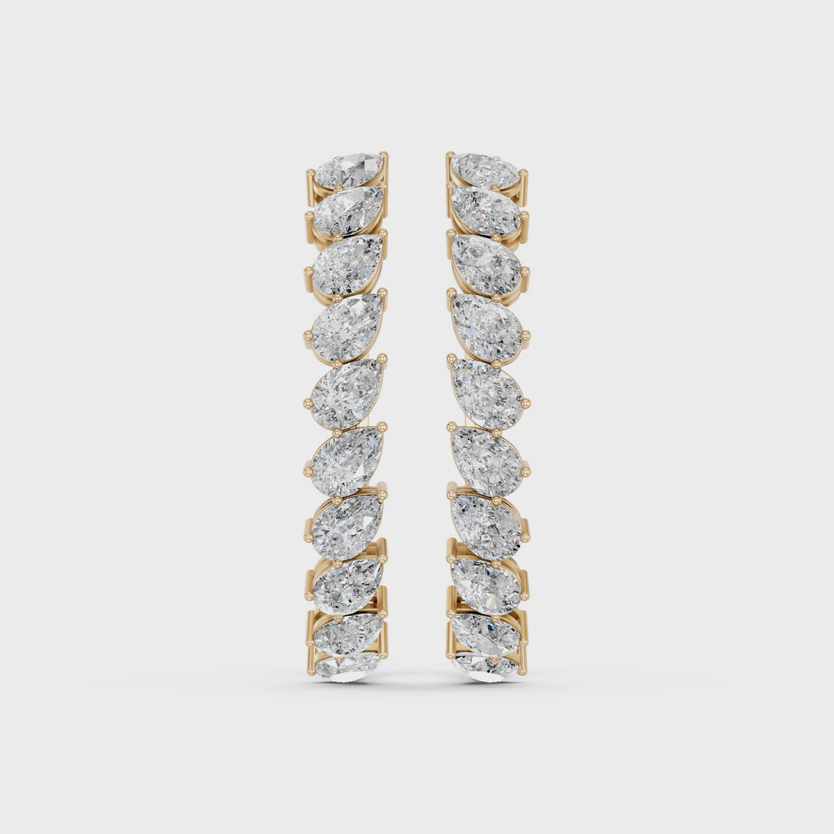 Tilted Pear Lab Diamond Hoop Earring in 14K Yellow Gold – video